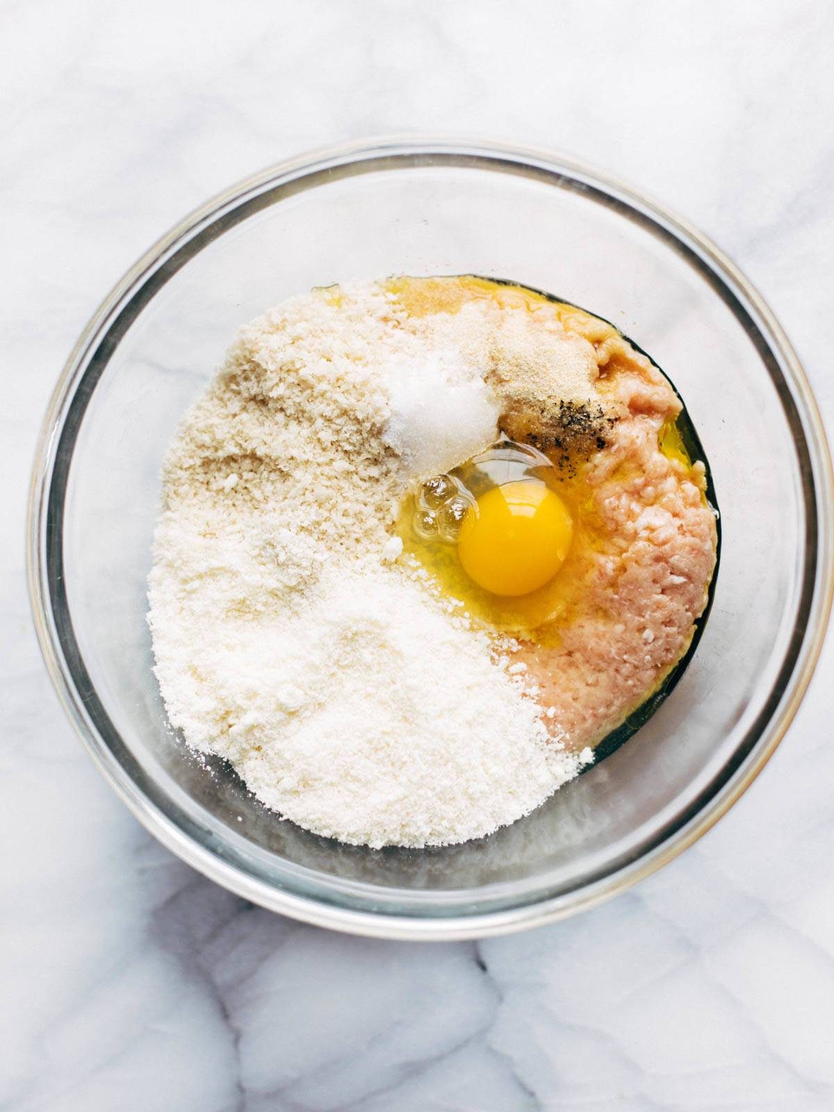 Ingredients for Baked Chicken Meatballs in a bowl.