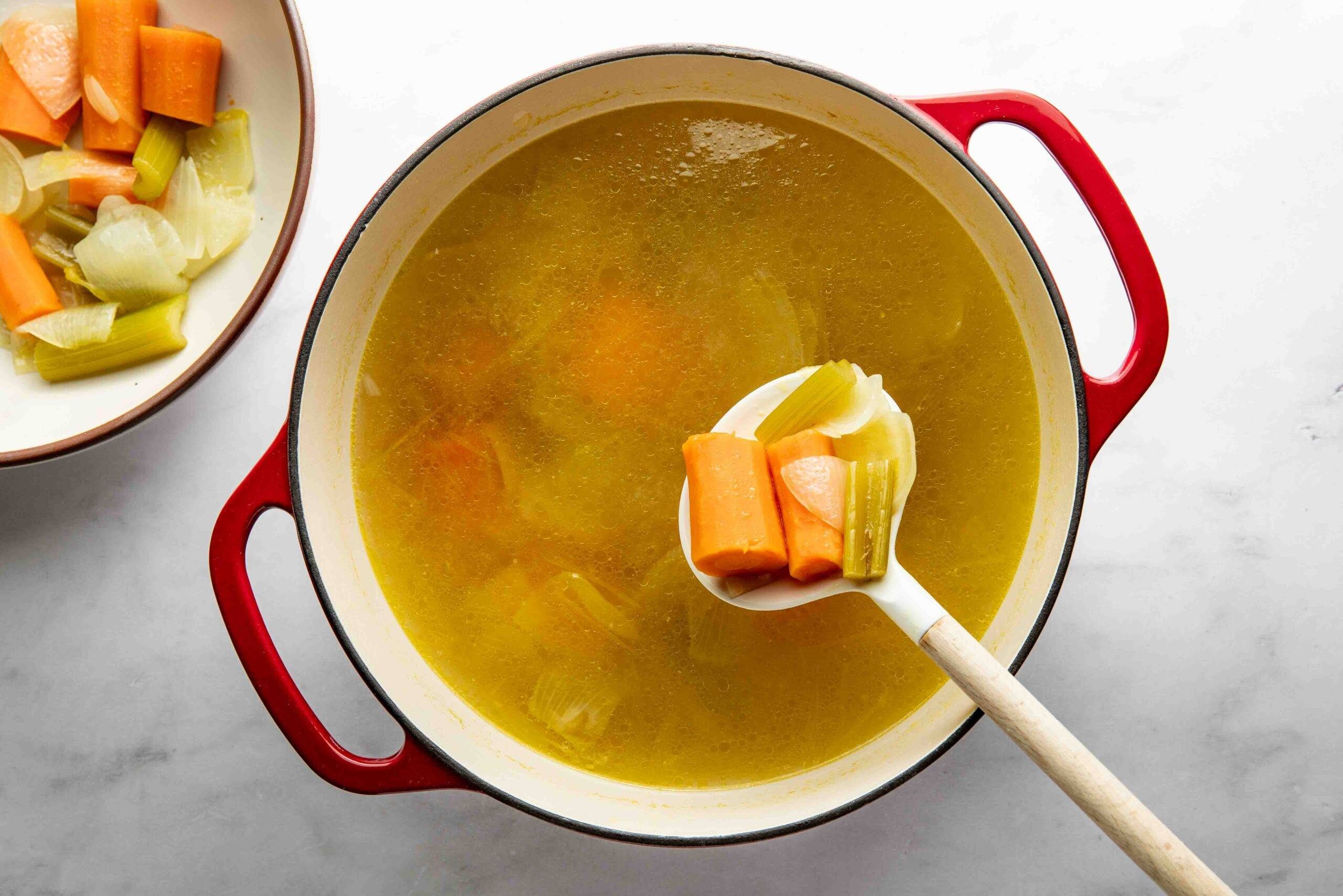 Removing the cooked vegetables