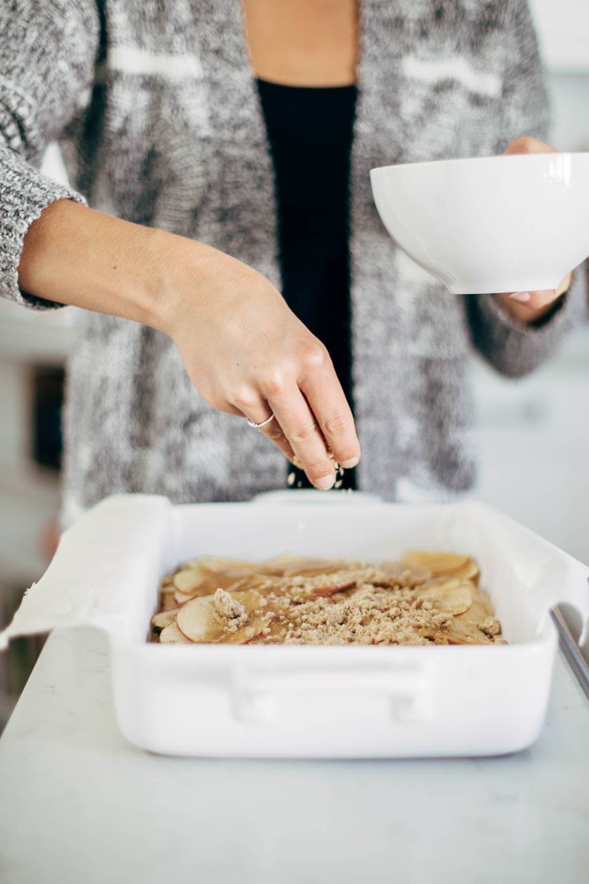 These layered bars are so simple! Loaded with homemade caramel and apples. Caramely apple layer tucked in by a brown sugar-y crust on both sides. | pinchofyum.com These layered bars are so simple! Loaded with homemade caramel and apples. Caramely apple layer tucked in by a brown sugar-y crust on both sides. | pinchofyum.com