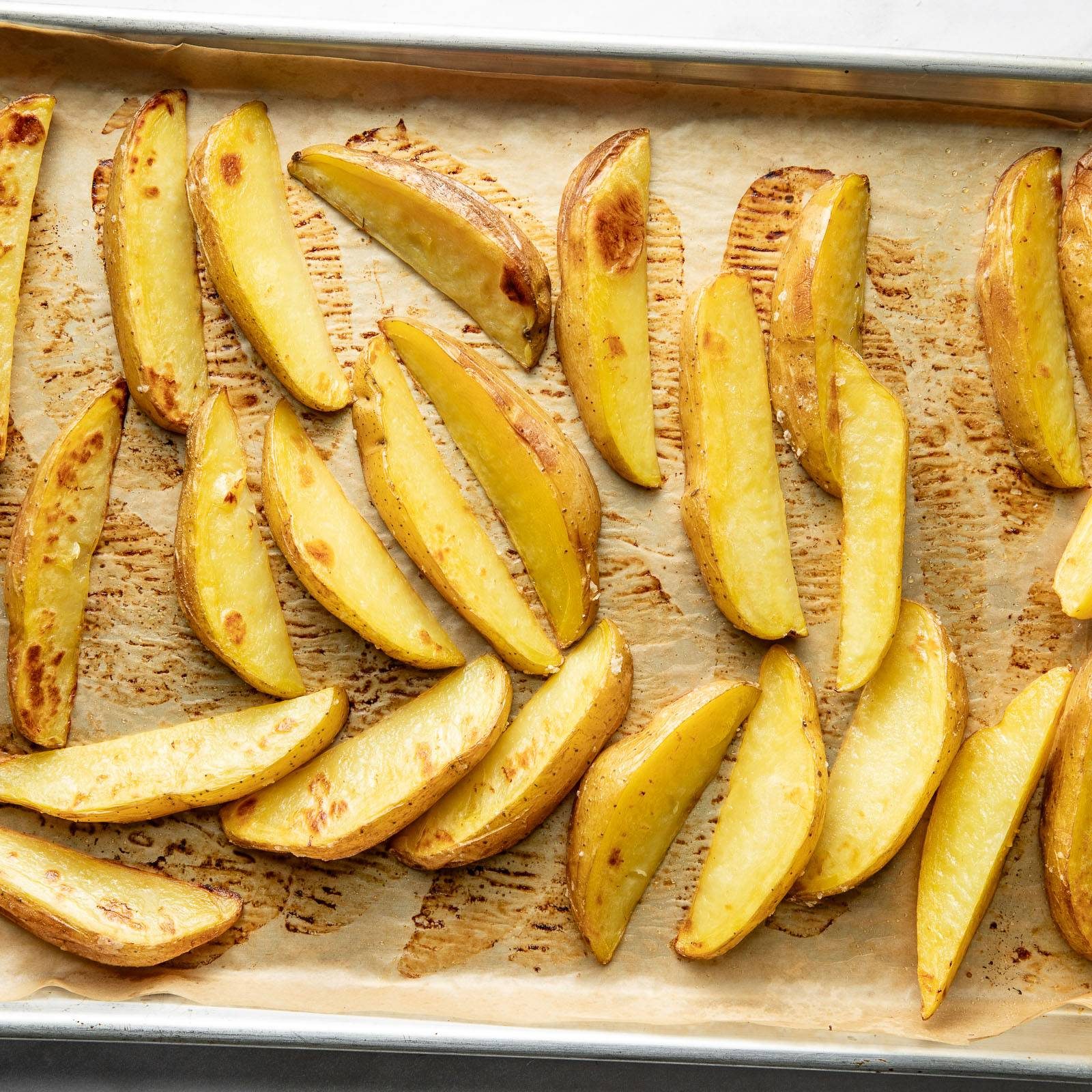 Roasting potatoes on a sheet pan.