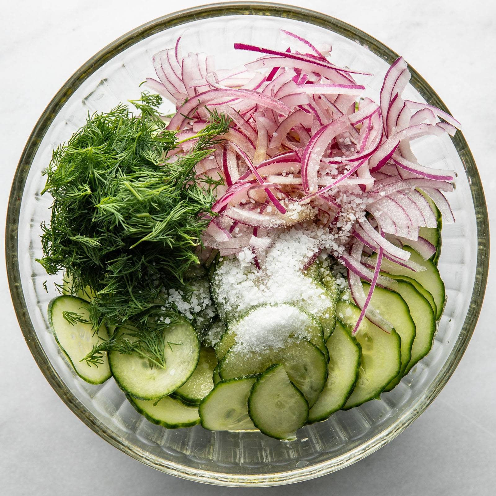 Cucumber salad in a bowl.
