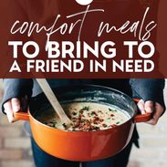 Woman holding a pot of soup