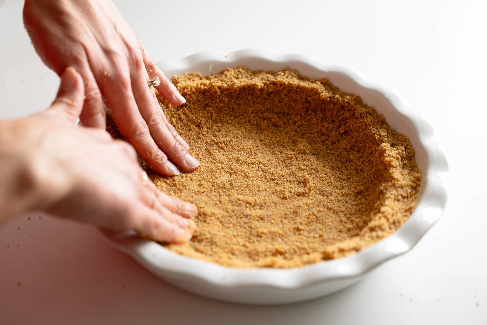 Form graham cracker crust in pie plate.