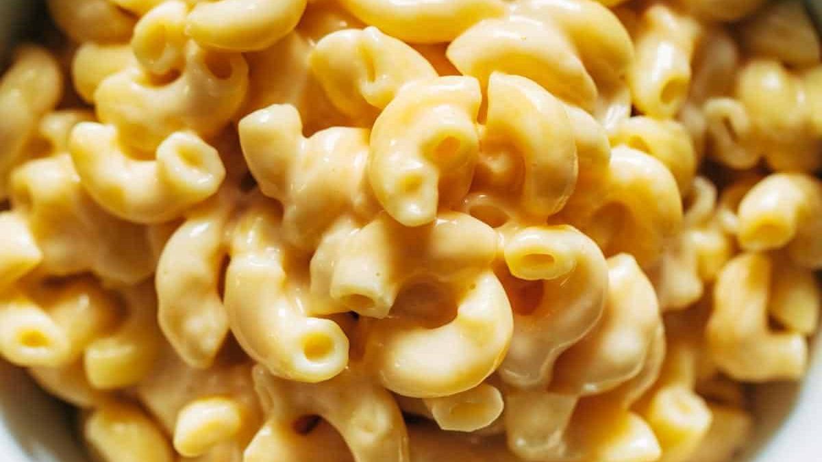 Mac and cheese piled high in a bowl.