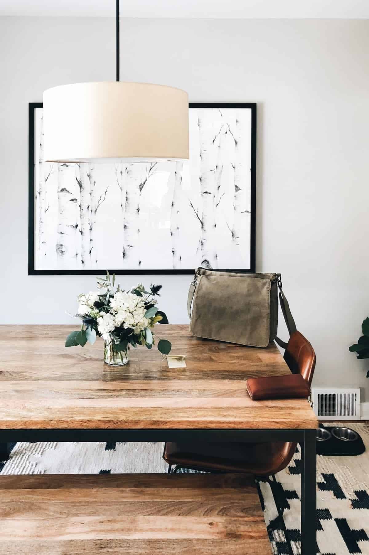 Dining room with wood table.