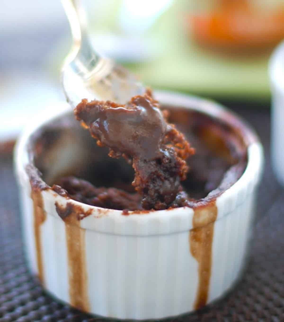 Molten Chocolate cake on a spoon.