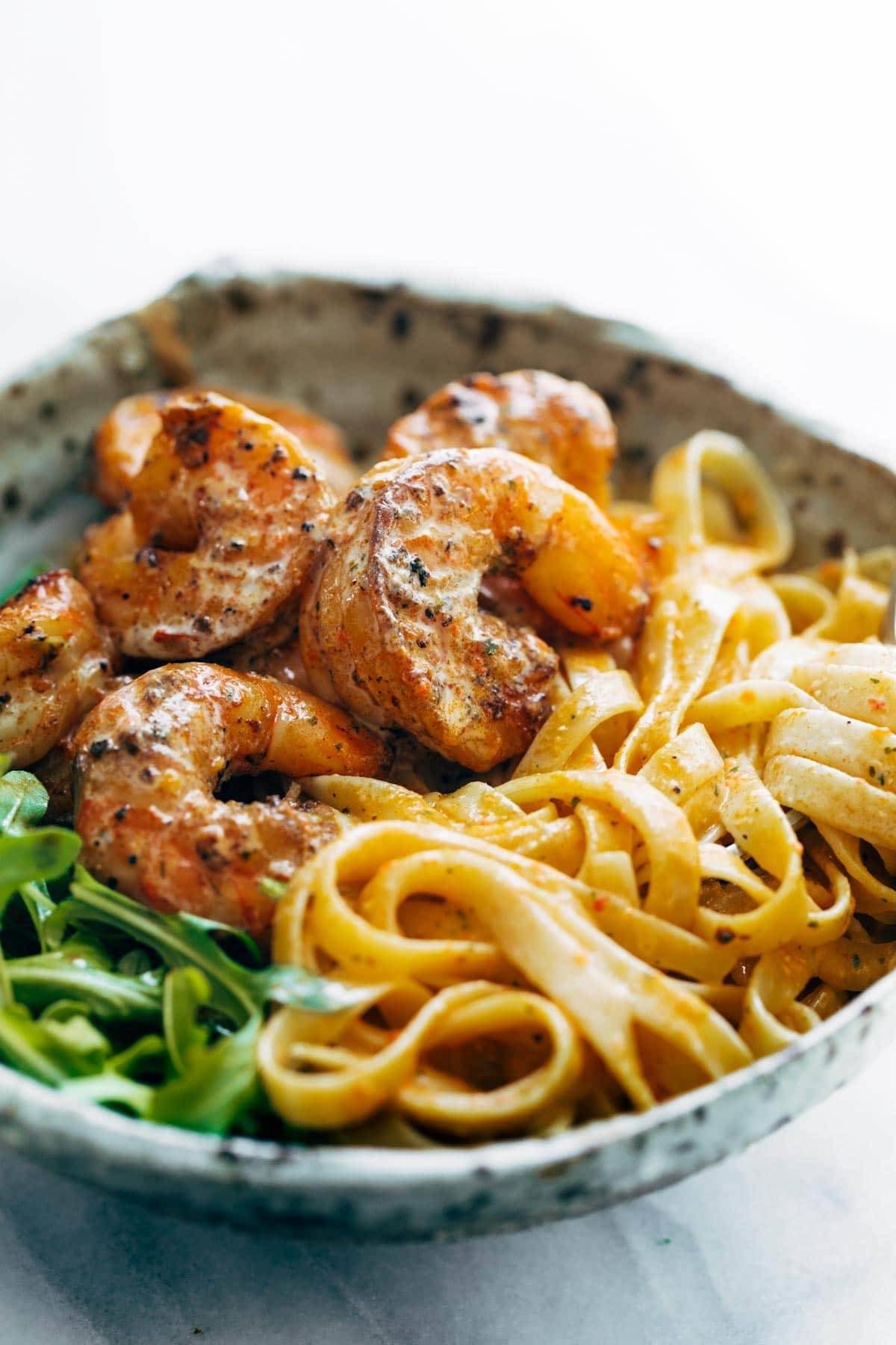 Red Pepper Fettuccine with Shrimp in a bowl.