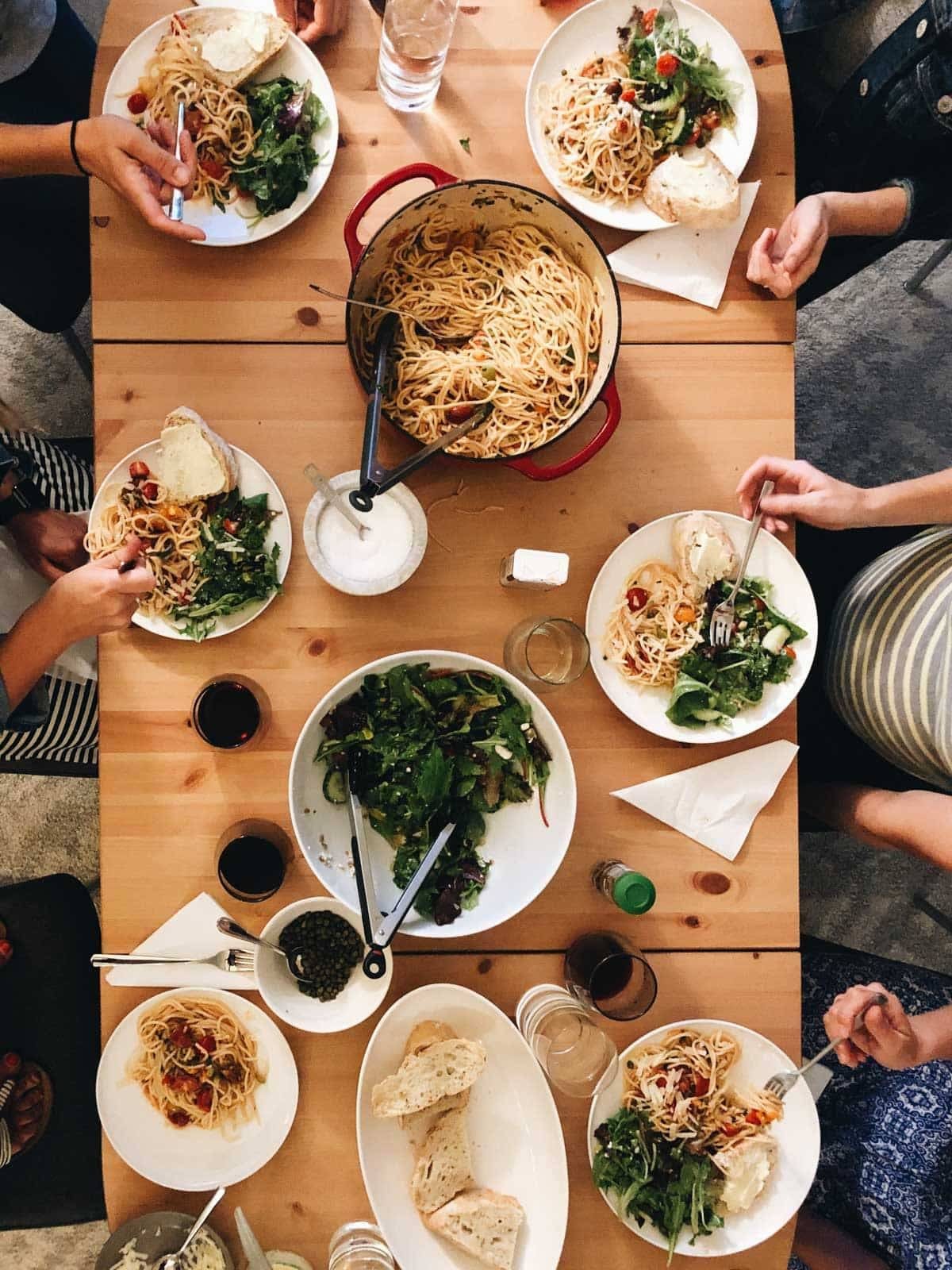 Pasta, salad, and bread for dinner club.