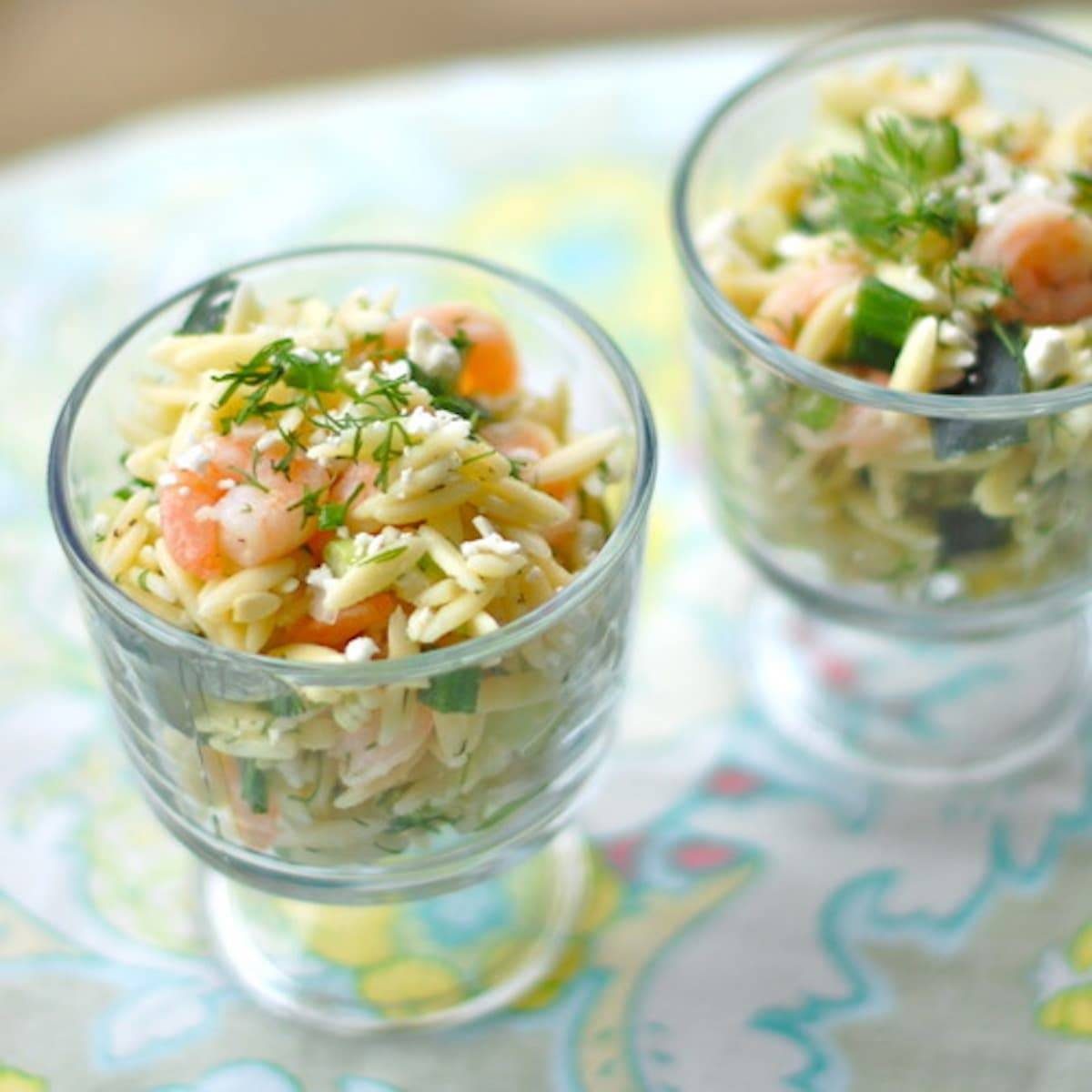Shrimp and feta orzo in two dishes.