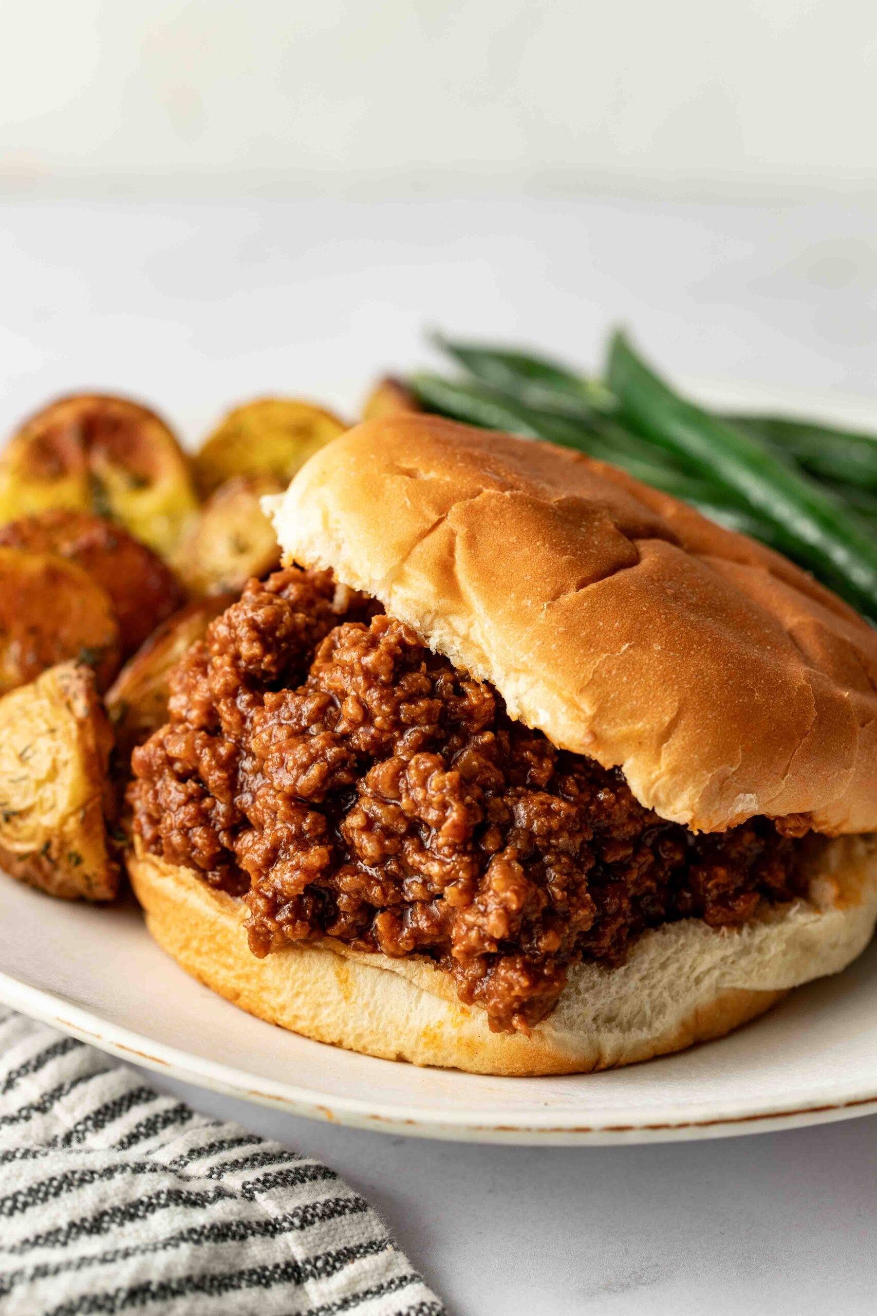 Sloppy joe sandwich on a plate.