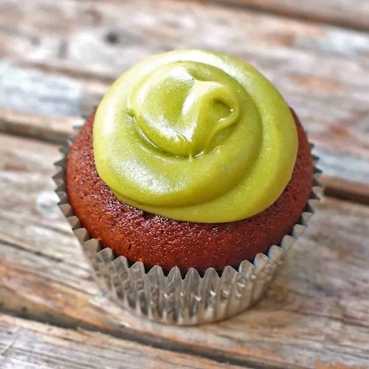 Milk chocolate cupcake with a sweet, creamy avocado buttercream.