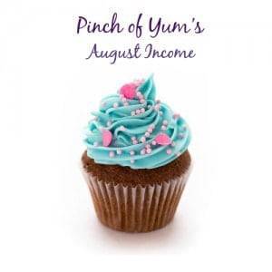 Pinch of Yum's August Income with a cupcake.