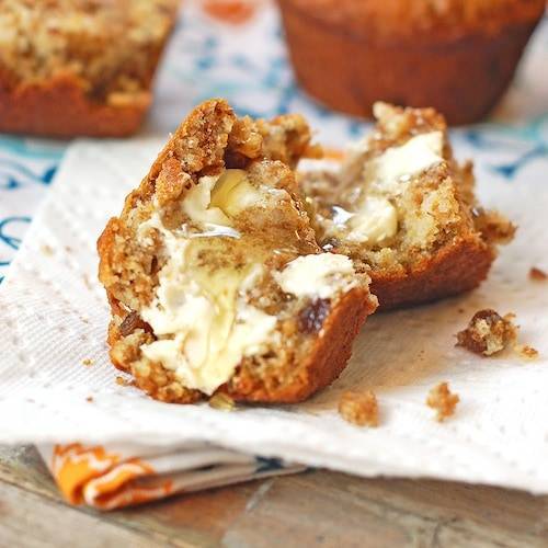 raisin bran muffins with honey and butter.