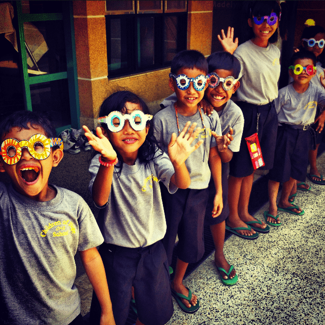 Children wearing glasses.