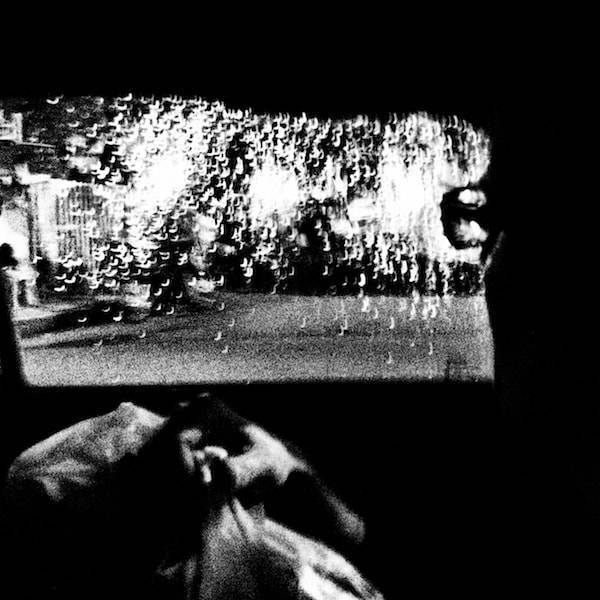 Black and white taxi window.