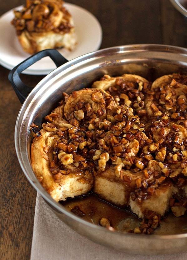 Homemade caramel rolls in a pan.