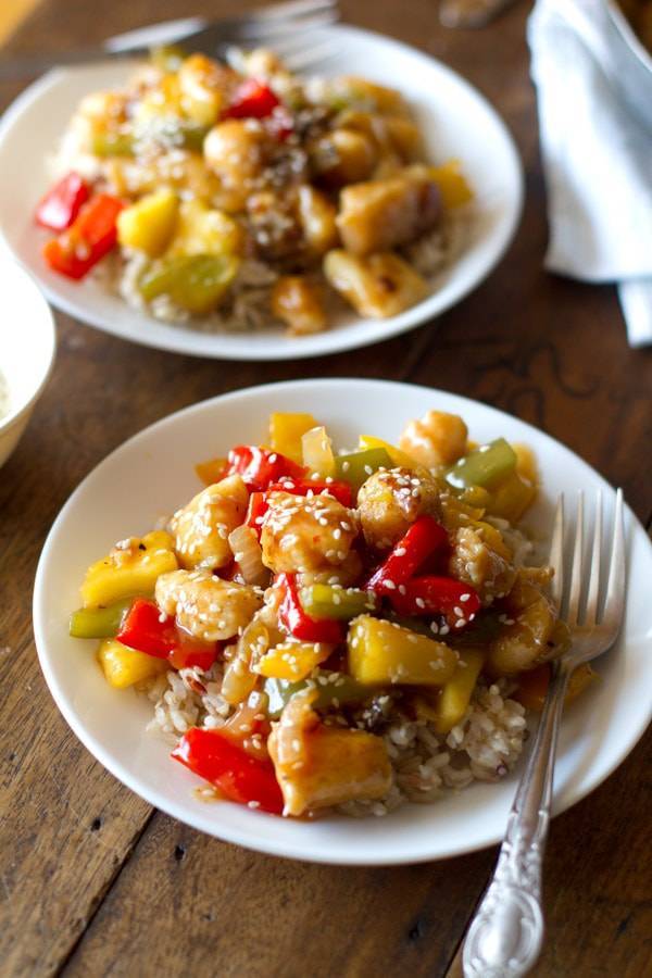 Sweet and sour fish on two plates.