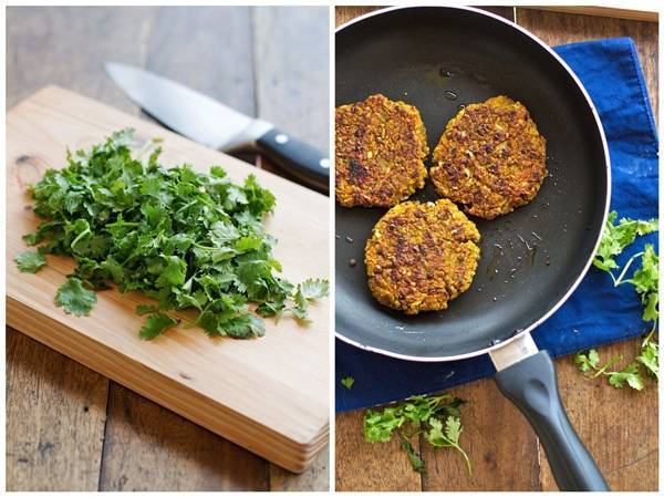 Herbs on a cutting board and burgers on a skillet.