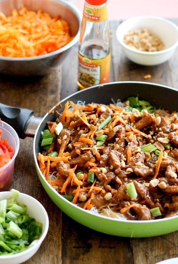 Hoisin pork with rice noodles and carrots.