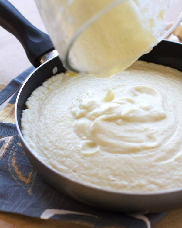 Creamy cauliflower sauce in a skillet.