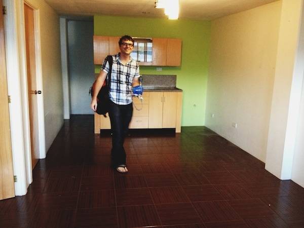Man in an empty apartment.