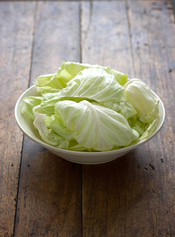 Lettuce in a white bowl.