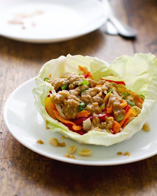 Thai chicken lettuce wrap on a plate.