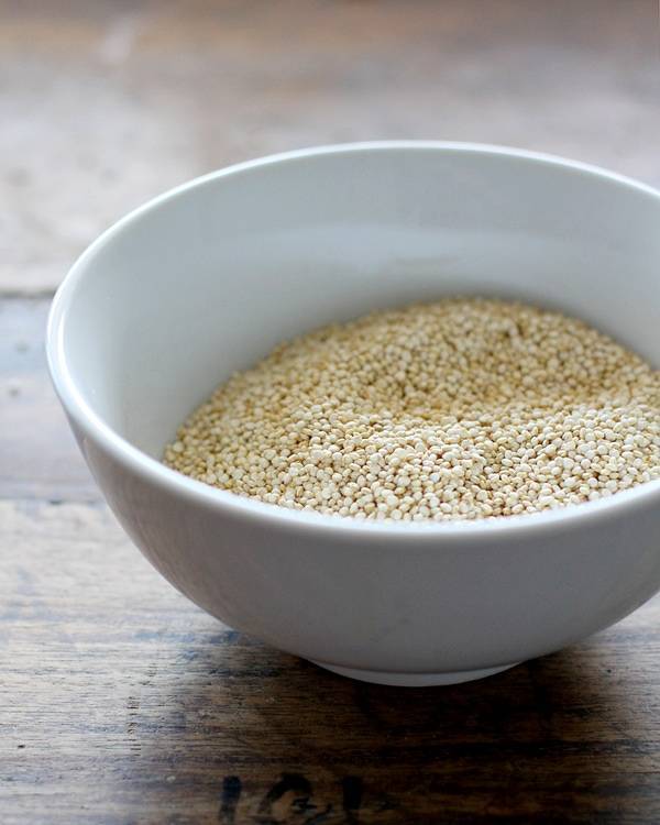 Quinoa in a white bowl.