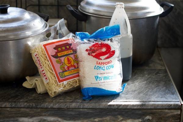 Bags of food on a counter.