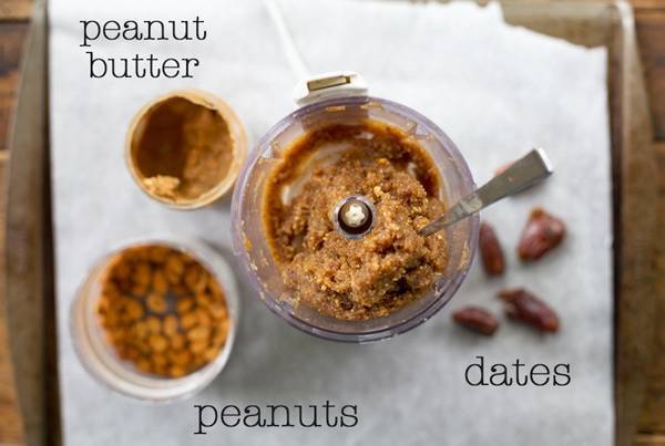 Peanuts, peanut butter, and dates in a food blender.