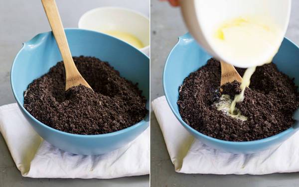 Crushed oreos in a blue bowl.