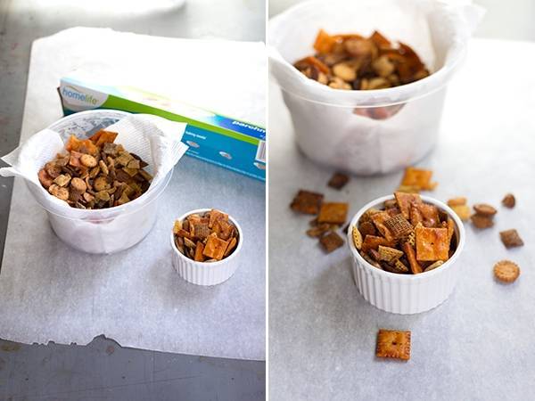 Parchment paper under containers of food.