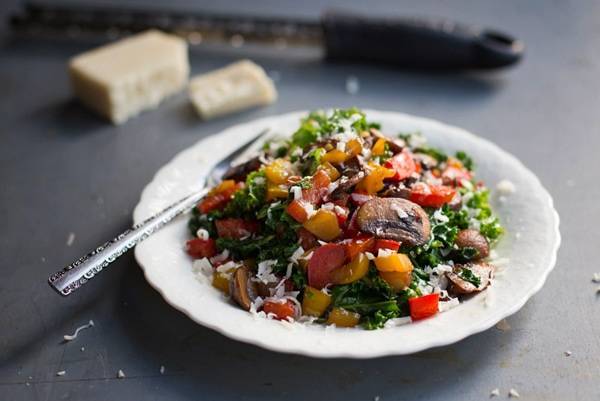 Balsamic kale salad on a white plate.