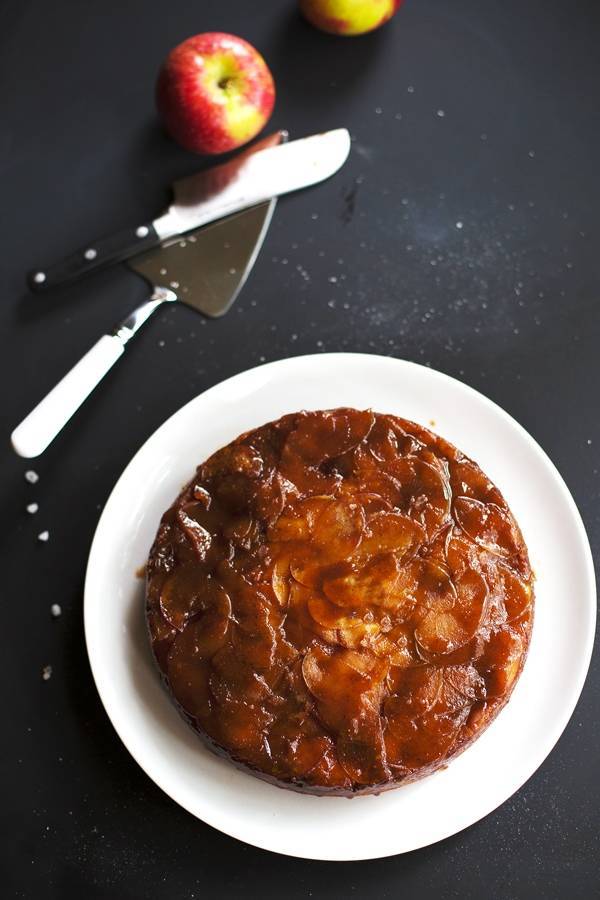 Salted Caramel Apple Upside Down Cake on a white plate.