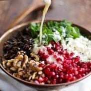 Pomegranate, Kale, and Wild Rice Salad with Walnuts and Feta - a perfect way to freshen up the table this Thanksgiving! | pinchofyum.com