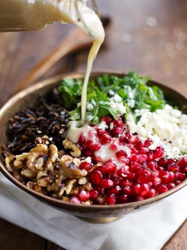 Pomegranate, Kale, and Wild Rice Salad with Walnuts and Feta - a perfect way to freshen up the table this Thanksgiving! | pinchofyum.com