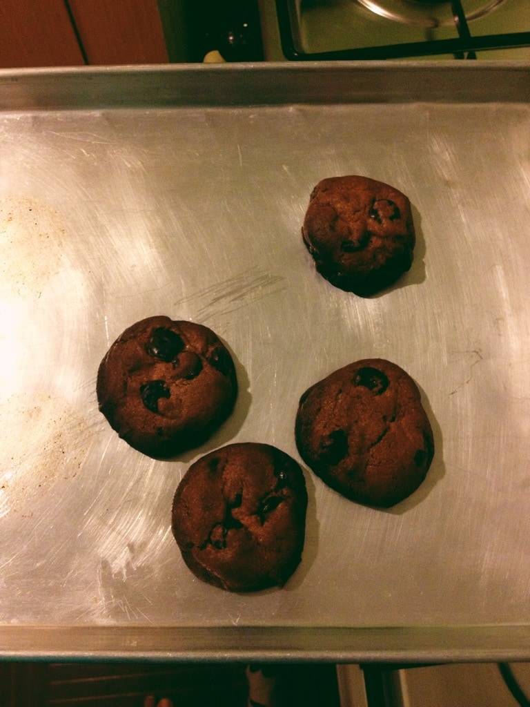 Burnt cookies on a pan.