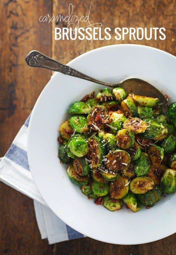 Caramelized brussels sprouts in a white bowl.