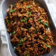 Super Easy Crockpot Shredded Pork - and a trick for getting those deliciously golden crispy bits! | pinchofyum.com