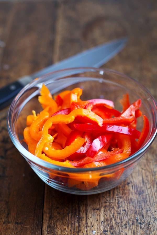Peppers in a clear bowl.