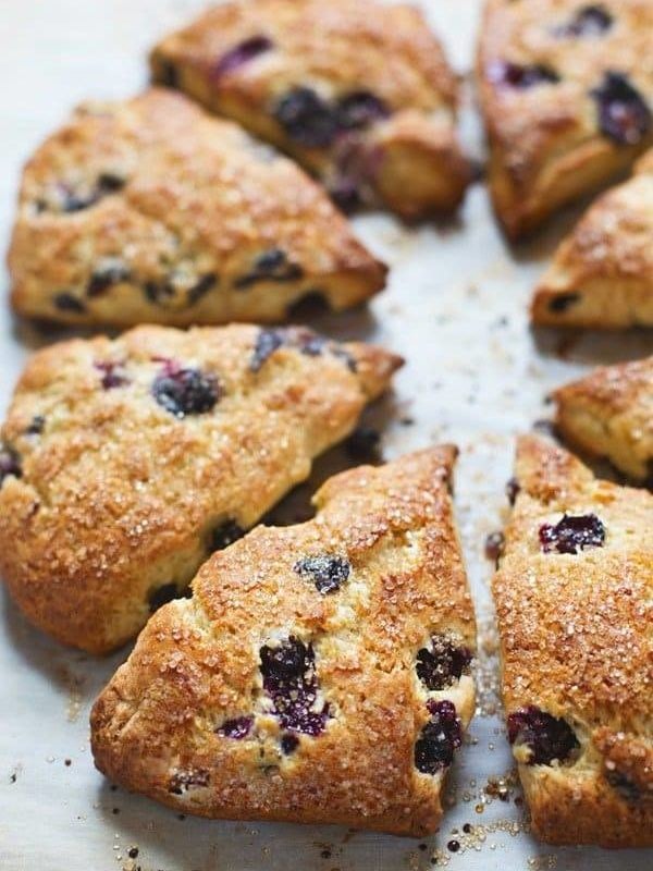 Bakery Style Blueberry Scones - crunchy sugaroutside, juicy blueberries + flaky tender inside. | pinchofyum.com