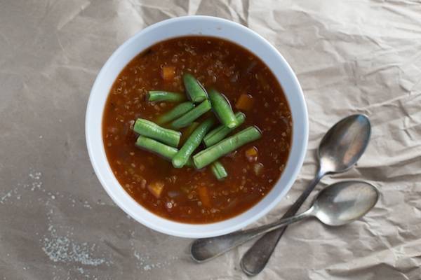 Soup in a bowl with green beans.