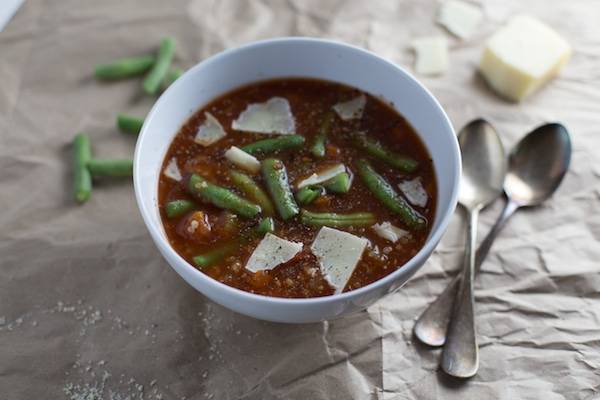 Soup in a bowl with spoons.