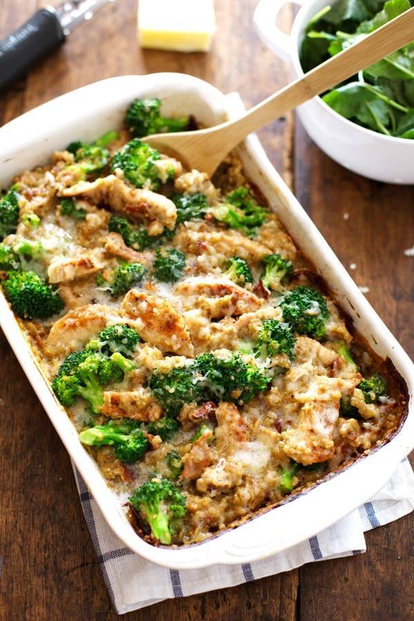 Creamy Chicken Quinoa and Broccoli Casserole in a white baking dish.