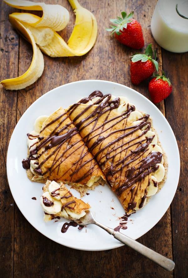 Almond Oat Banana Crepes on a white plate.