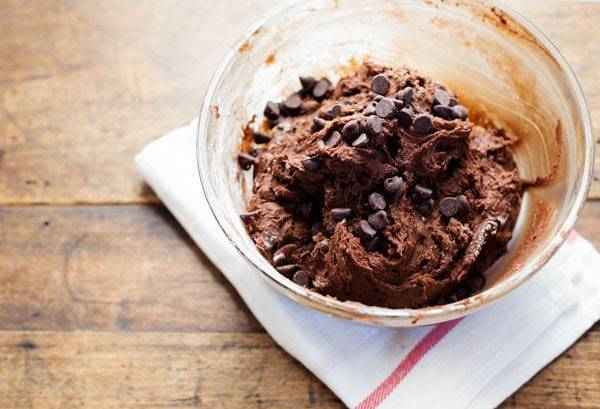 Chocolate cookie dough in a mixing bowl.