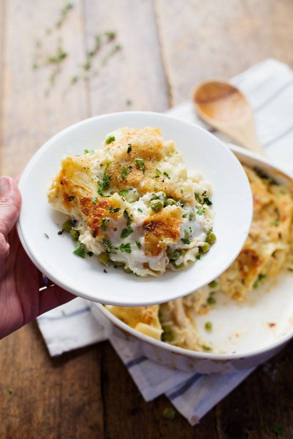 Garlic Parmesan Chicken Lasagna Bake on a white plate.