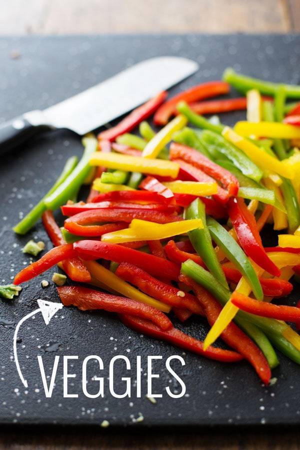 Peppers on a cutting board.