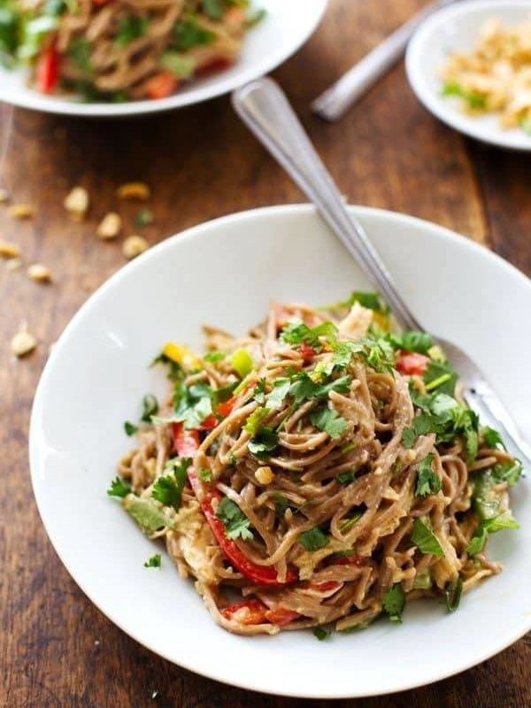 Spicy Peanut Chicken Soba Noodle Salad - colorful bell peppers with chewy soba noodles, shredded chicken, and a life changingly simple Spicy Peanut Sauce. Hot or cold, yumyumyum. 320 calories. | pinchofyum.com