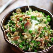 Spring Quinoa Salad with Honey Lemon Vinaigrette - peas, bacon, fresh herbs, almonds. Serve on spinach for fresh take-to-work lunches! | pinchofyum.com